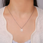 Necklace with Arabic Islamic crescent moon and Hamsa pendant in silver
