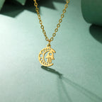 Necklace with Arabic Islamic crescent moon and Hamsa pendant in gold