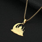 Necklace with a mosque pendant on an Arabic, Islamic, Muslim crescent moon in gold