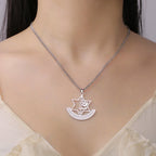 Necklace with pendant featuring the Star of David and symbolic Jewish fleur-de-lis in silver