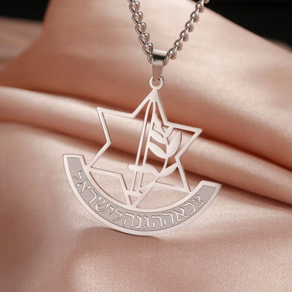 Necklace with pendant featuring the Star of David and symbolic Jewish fleur-de-lis in silver