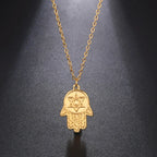Necklace with protective pendant featuring the Star of David and Hamsa in gold