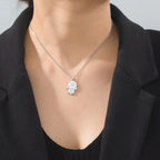 Necklace with protective pendant featuring the Star of David and Hamsa in silver
