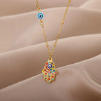 Necklace with multicolored Arabic evil eye and Fatima's hand protection pendant gold
