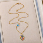 Necklace with multicolored Arabic evil eye and Fatima's hand protection pendant