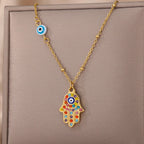 Necklace with multicolored Arabic evil eye and Fatima's hand protection pendant gold