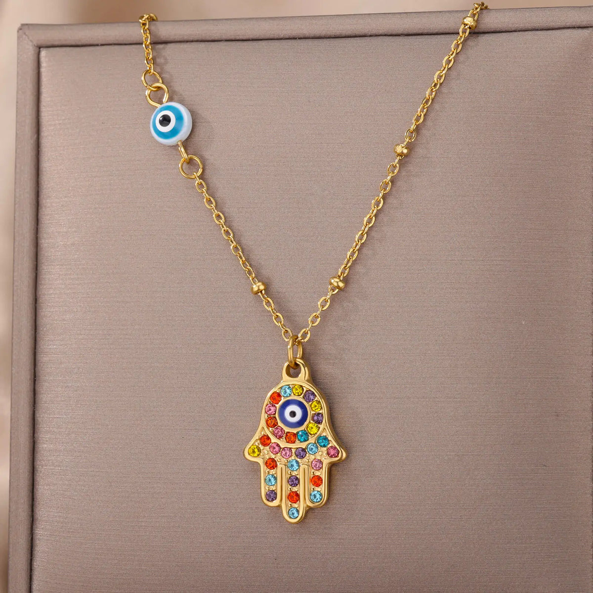 Necklace with multicolored Arabic evil eye and Fatima's hand protection pendant gold
