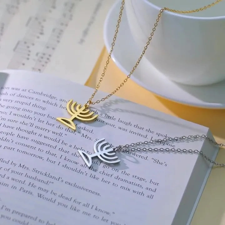 Necklace with pendant of the Jewish identity symbol Menorah