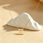 Necklace with pendant of the sacred temple of Jerusalem "The Beit Hamikdash" in gold-tone