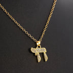 Necklace with crystal pendant of the Jewish symbol of life Chai in gold