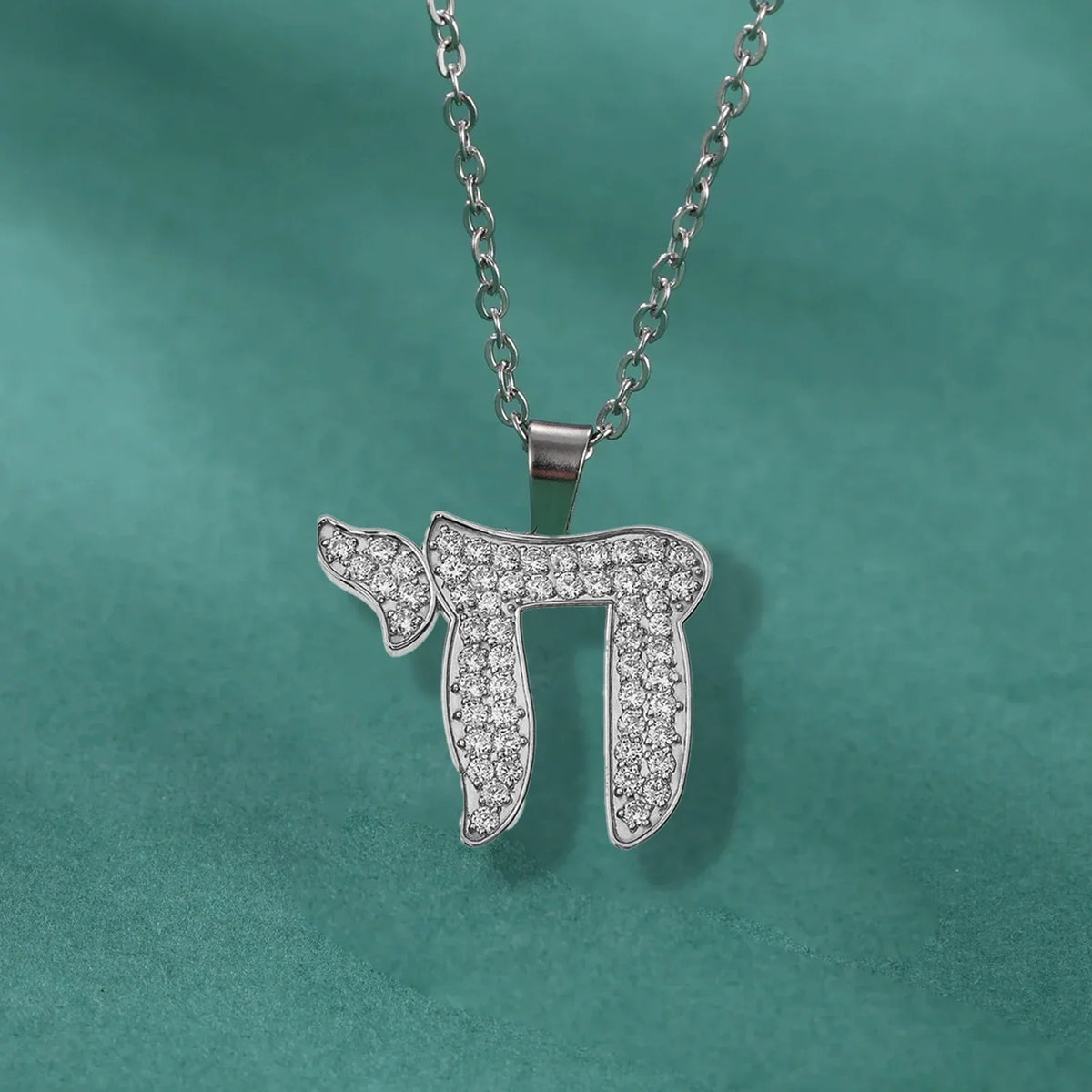 Necklace with crystal pendant of the Jewish symbol of life Chai in silver