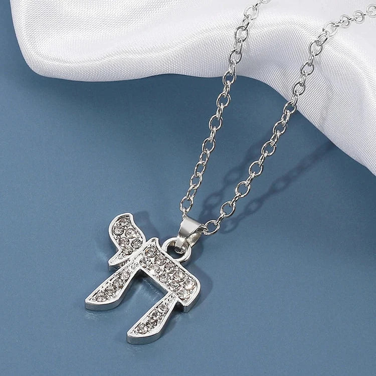 Necklace with crystal pendant of the Jewish symbol of life Chai in silver