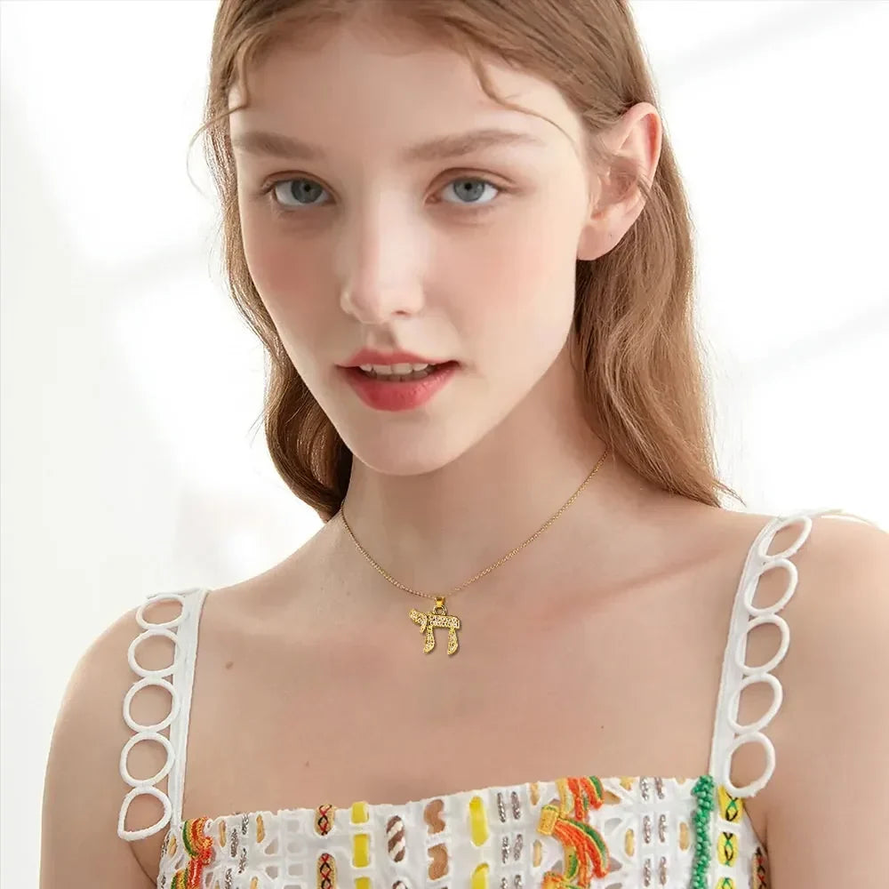 Necklace with crystal pendant of the Jewish symbol of life Chai in gold