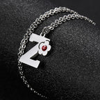 Initial pendant necklace with flower z