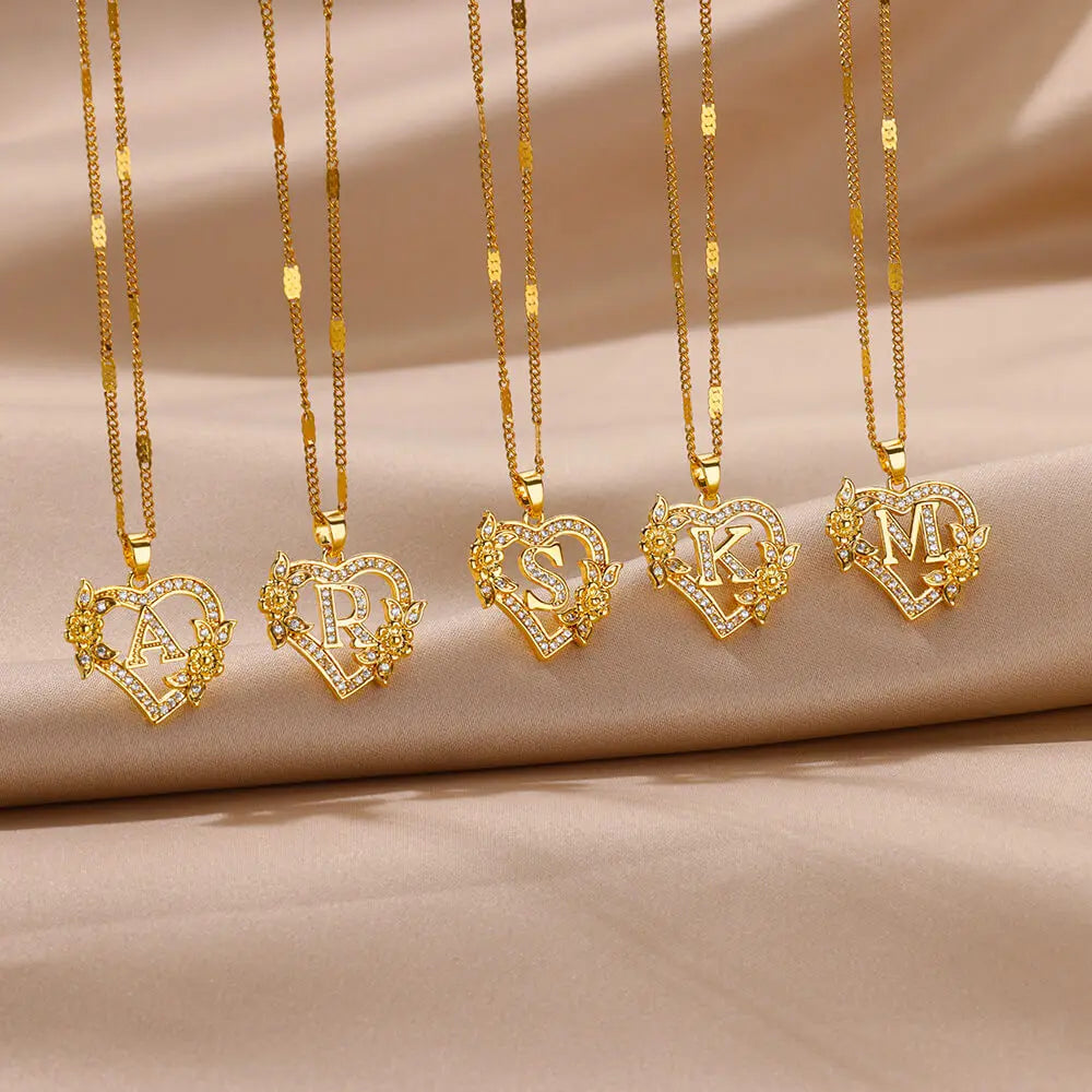 Necklace with initial and heart pendant