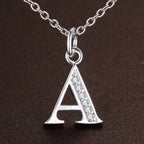 Long necklace with initial pendant a