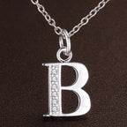 Long necklace with initial pendant b