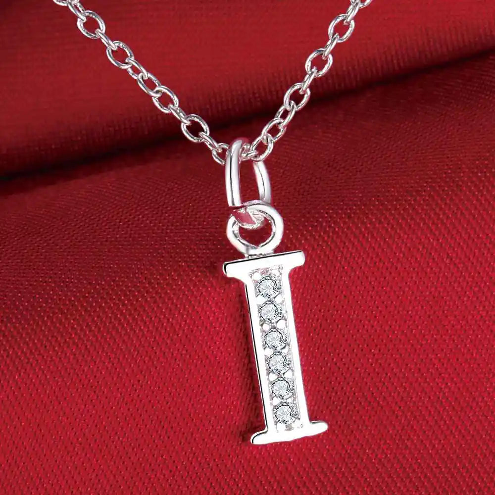Long necklace with initial pendant i