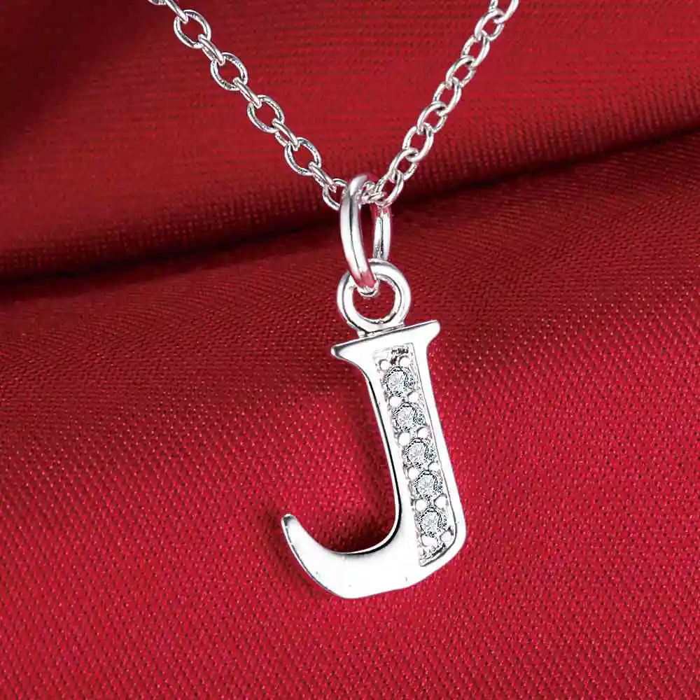 Long necklace with initial pendant j