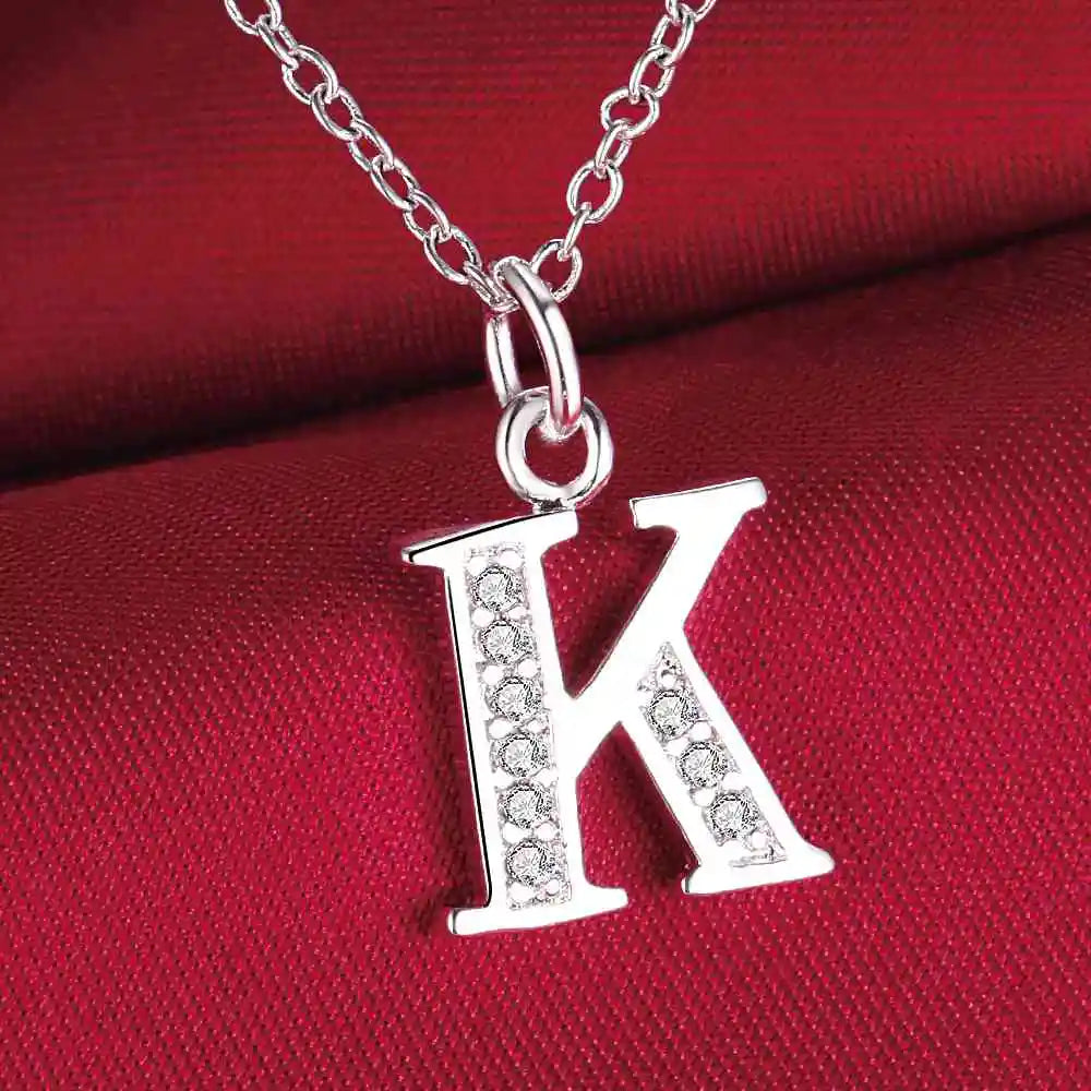 Long necklace with initial pendant k