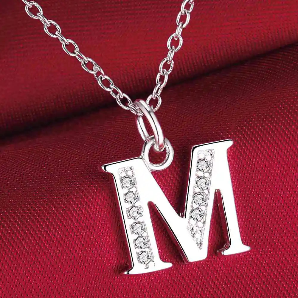 Long necklace with initial pendant m