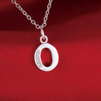 Long necklace with initial pendant o