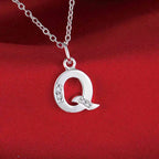 Long necklace with initial pendant q