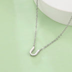 Necklace with initial letter pendant