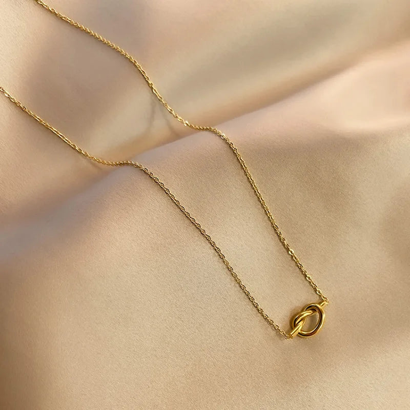 Necklace with a bow pendant for women