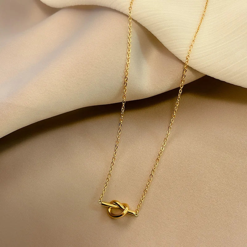 Necklace with a bow pendant for women
