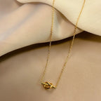 Necklace with a bow pendant for women