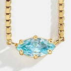 Eye-shaped birthstone pendant necklace March