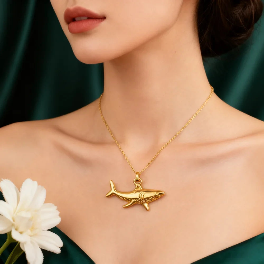 Gold shark pendant necklace