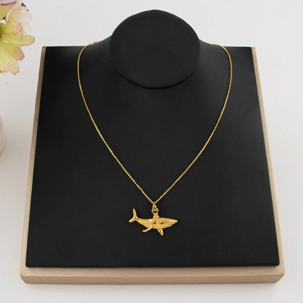 Gold shark pendant necklace