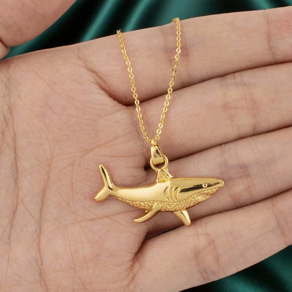 Gold shark pendant necklace
