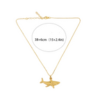 Gold shark pendant necklace