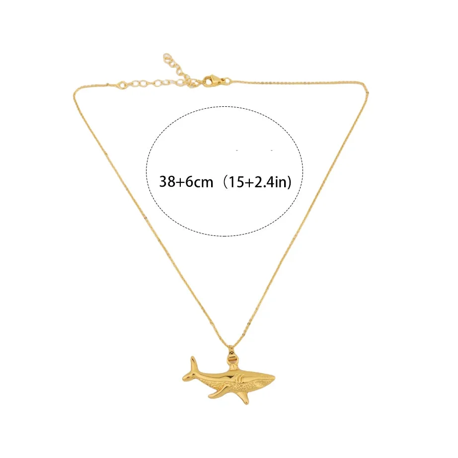 Gold shark pendant necklace