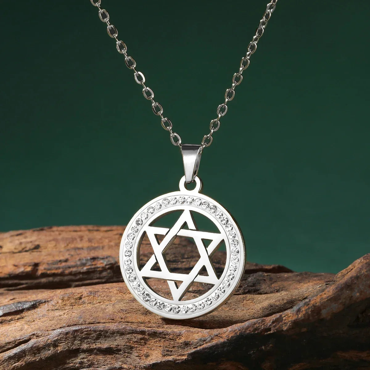 Necklace with round pendant featuring the Jewish symbol, Star of David, silver