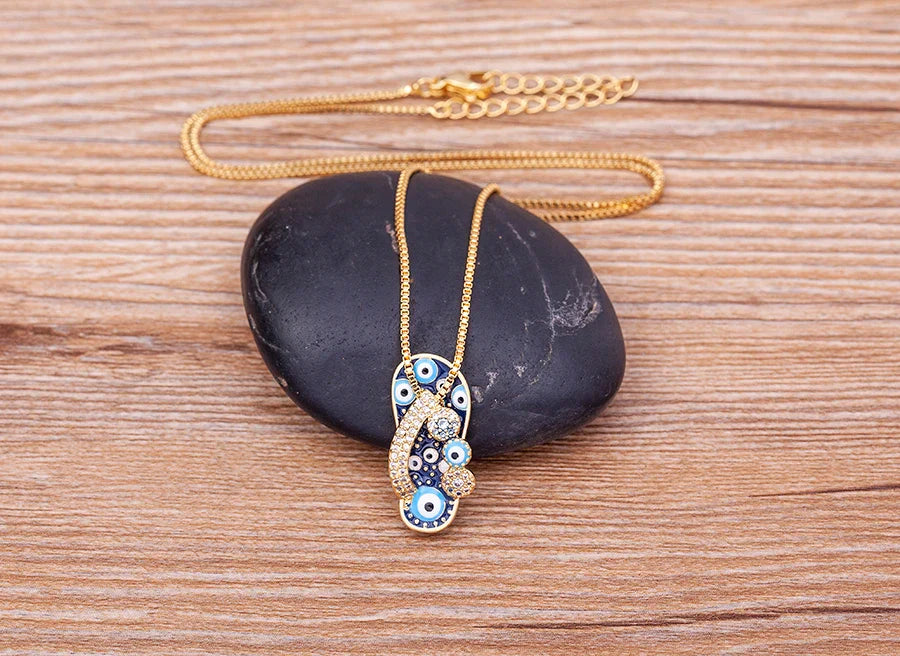 Necklace With Tongue Pendant Blue Eye And Zircon