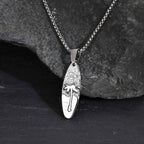 Necklace with small palm tree and sea pendant in silver