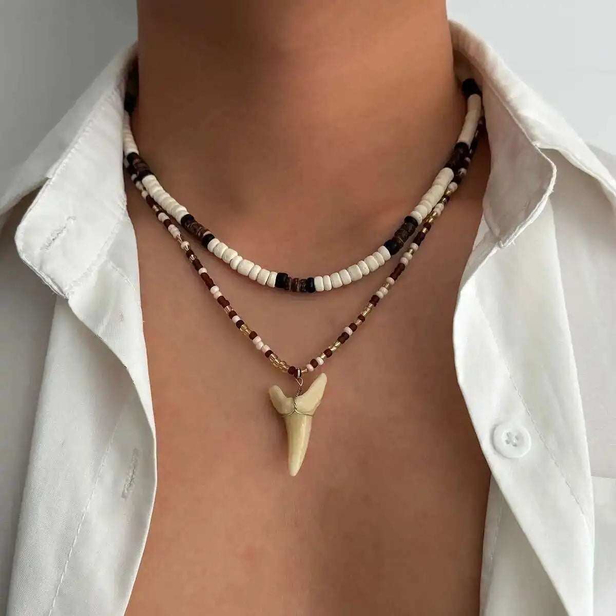 Set of 2 boho necklaces with shells and brown shark tooth pendant