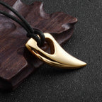 Cord necklace with gold shark tooth pendant