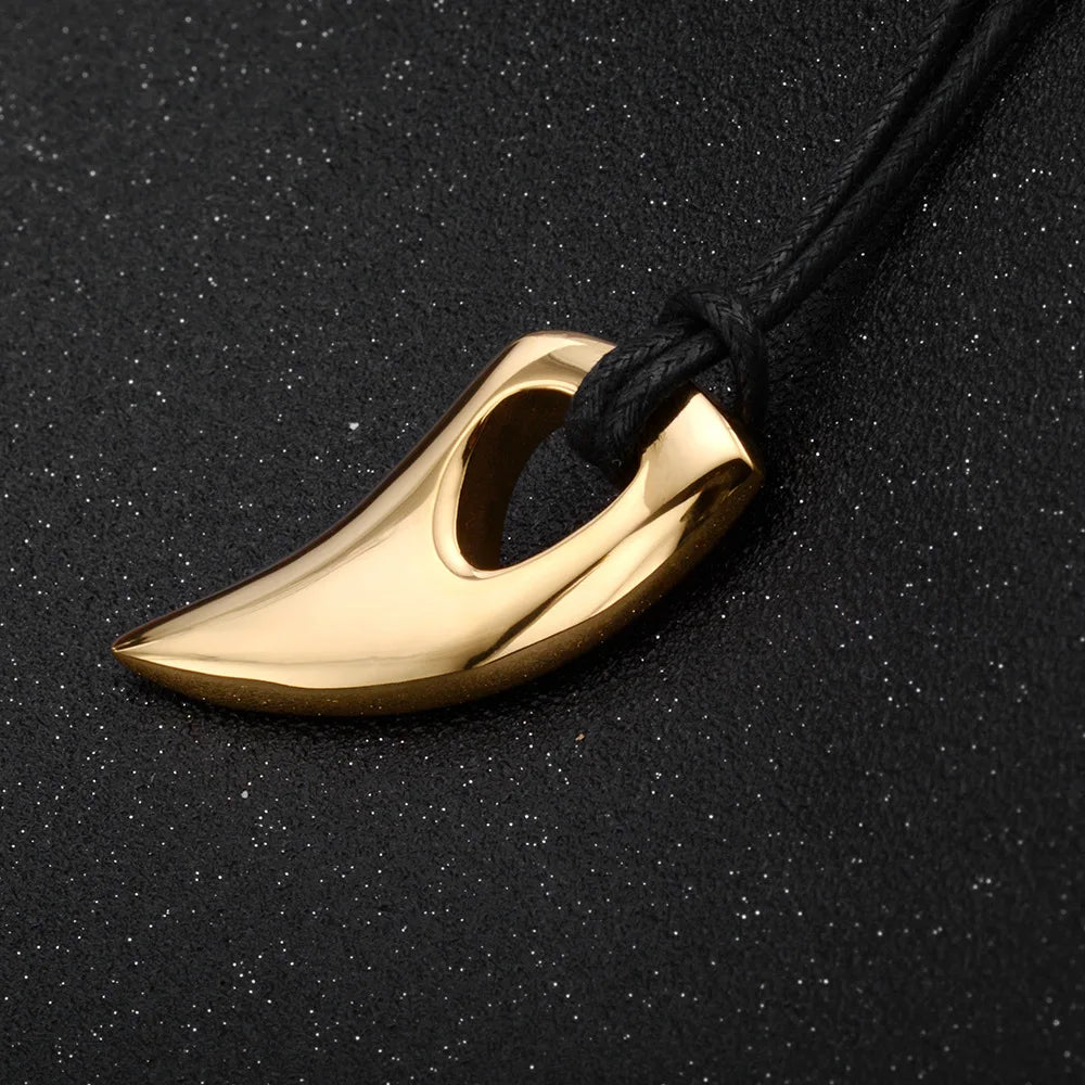 Cord necklace with gold shark tooth pendant