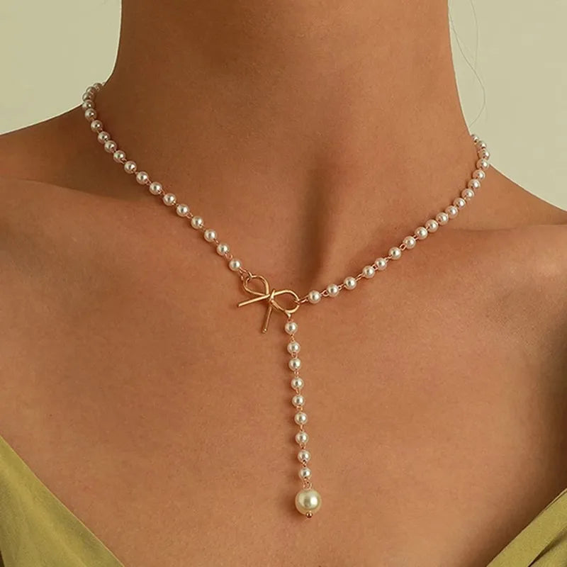 Pearl Necklace with White Bow Pendant