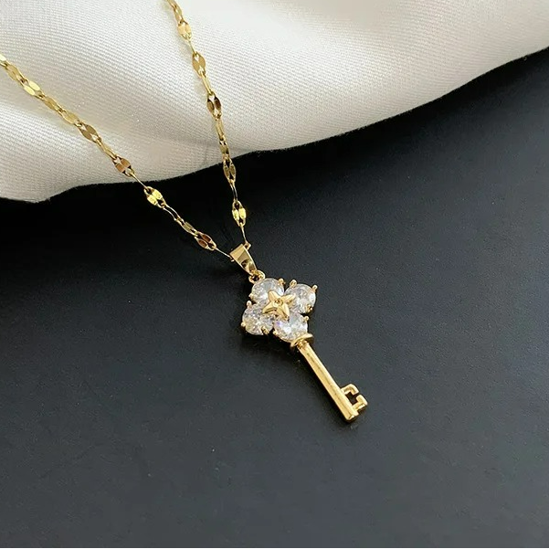 Necklace with key pendant with rhinestones