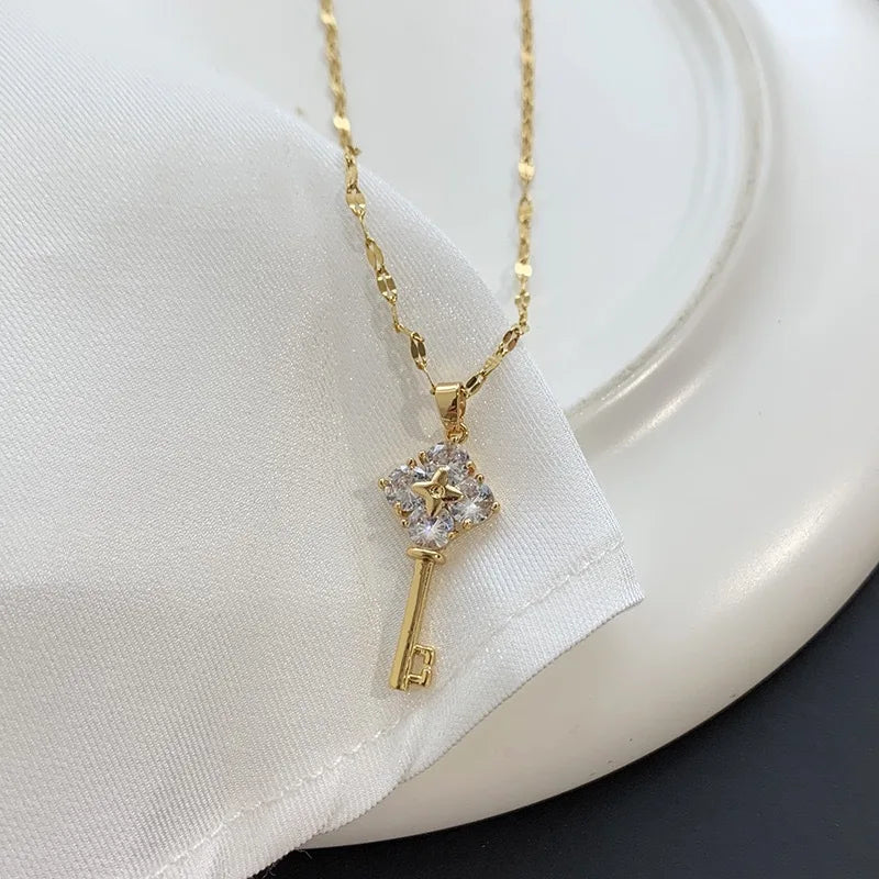 Necklace with key pendant with rhinestones