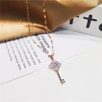 Necklace with key pendant with rhinestones
