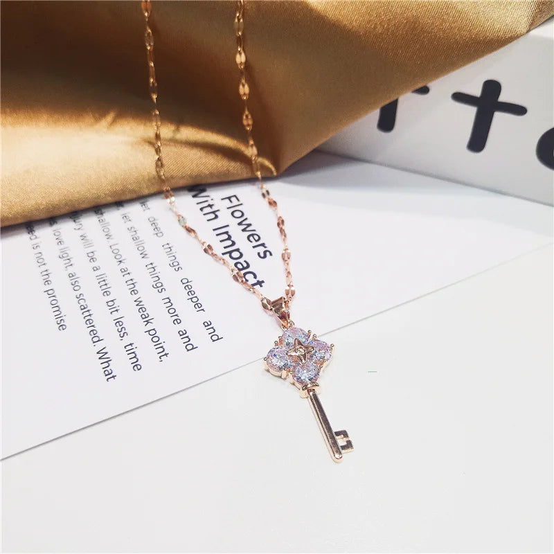Necklace with key pendant with rhinestones