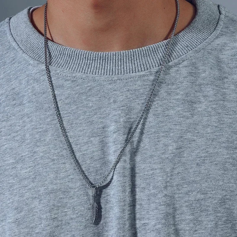 Silver-tone feather necklace and pendant