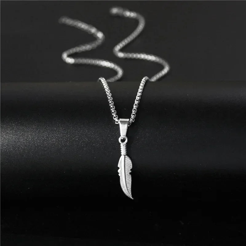 Silver-tone feather necklace and pendant